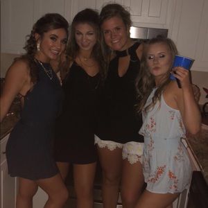 black/sunflower romper!